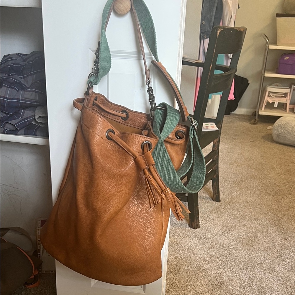 Elegant Tan Leather Shoulder Bag with Green Strap